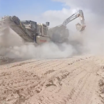 Mobile crushing plant working in a stone quarry